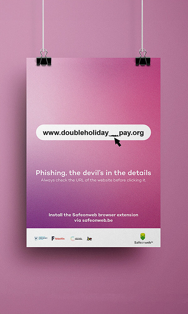 Hanging poster showing a fake phishing URL on a pink background with the message “Phishing, the devil’s in the details”.